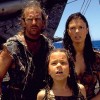 A picture of three survivors of a world wide environmental disaster from the movie Waterworld.