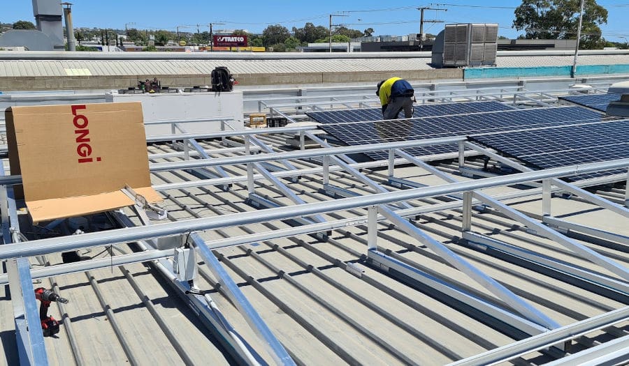 Partially built solar array on a roof