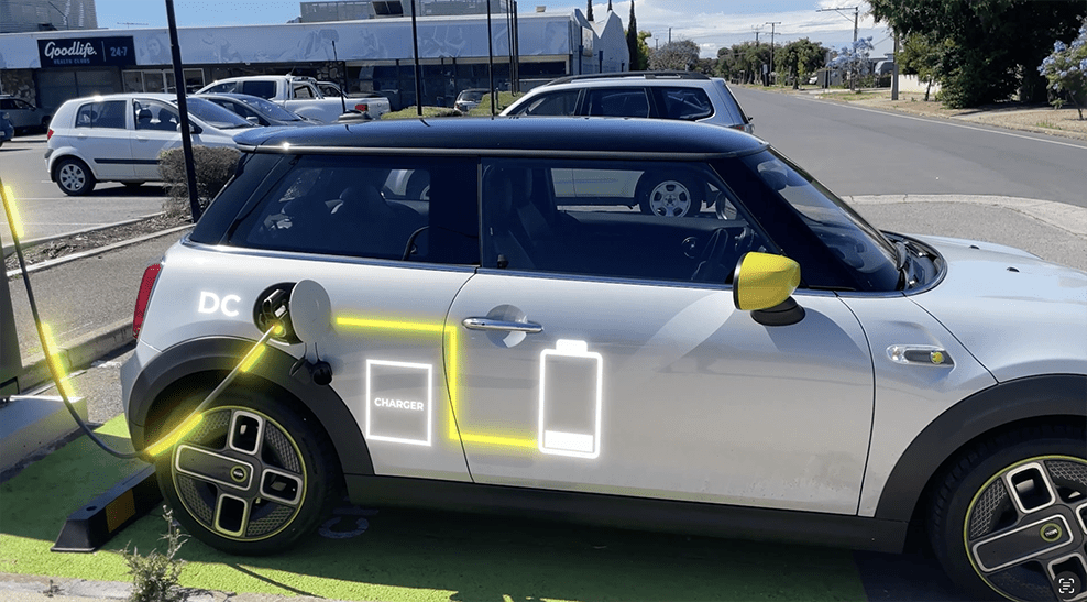 A Mini Cooper SE charging at a DC public fast charger