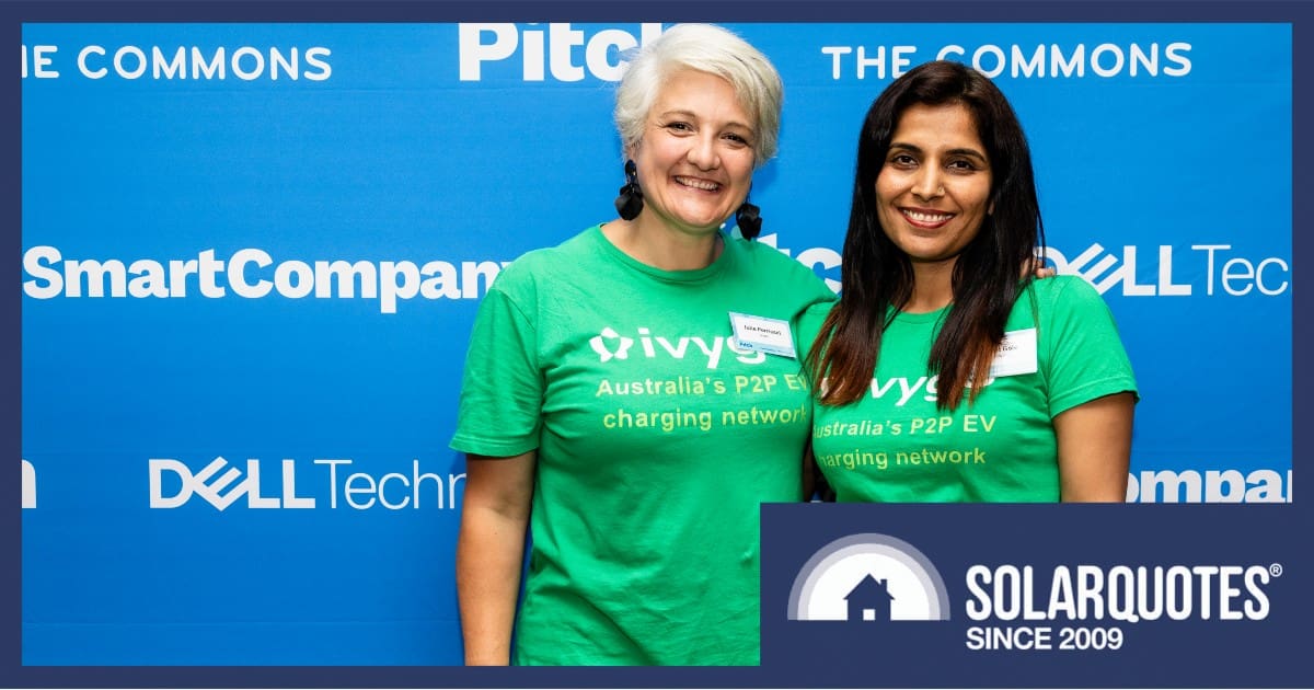 Two women in green shirts