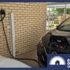 A bidirectional EV charger charging a Nissan Leaf