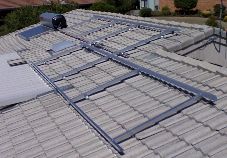 Solar hot water and incomplete solar power system on a roof