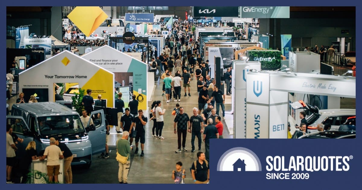 Crowds walk amongst EV exhibits