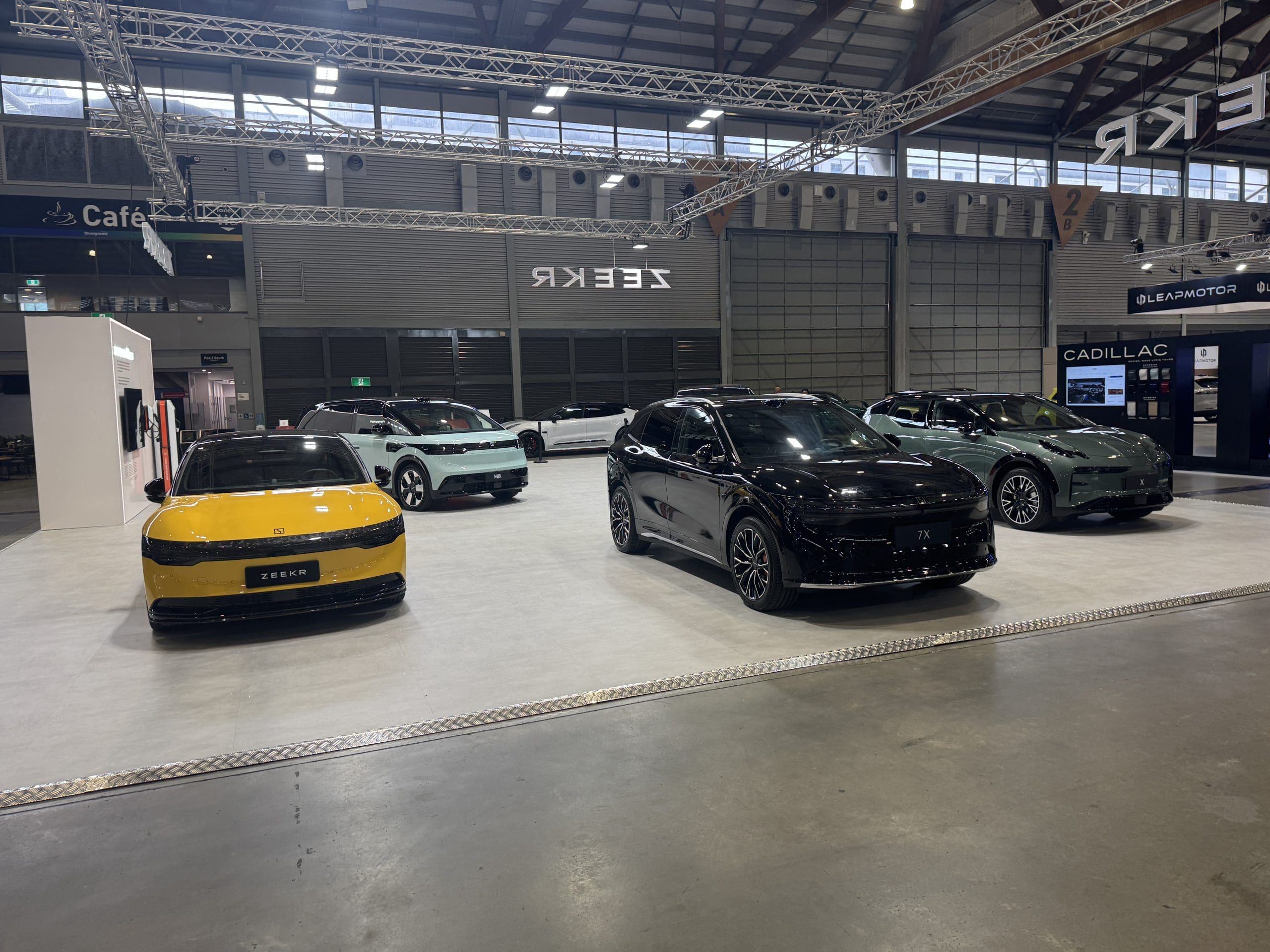 Cars on exhibit in a hall