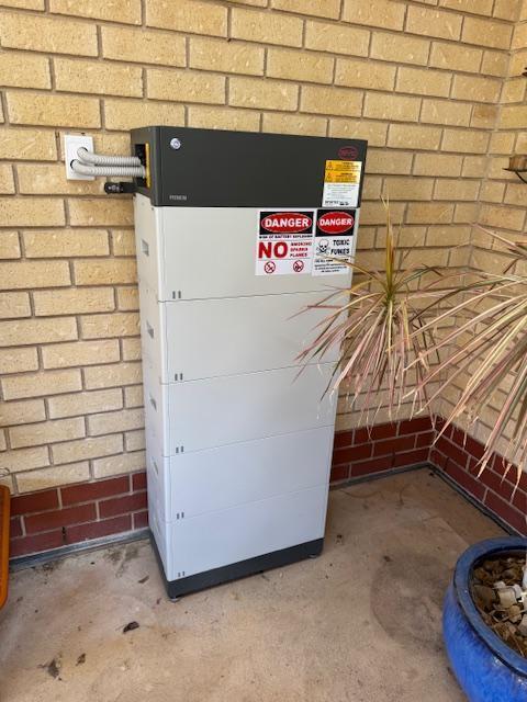 A BYD B-Box stack installed by Goliath Solar and Electrical against an Australian home