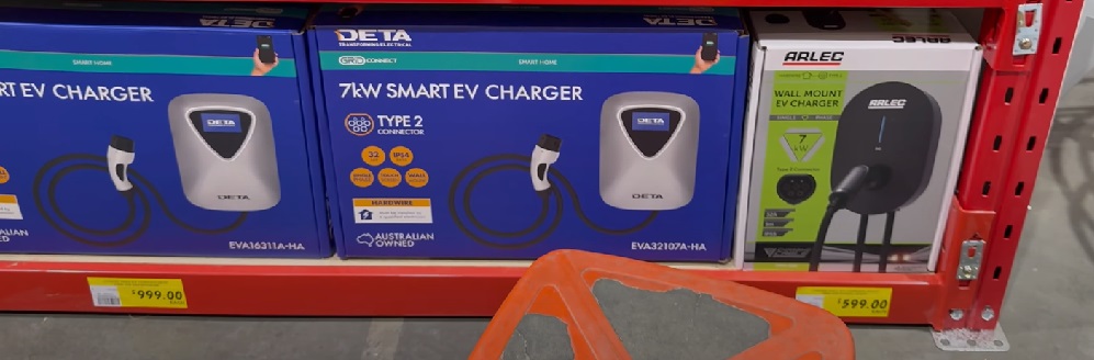 Deta and Arlec EV chargers on shelves in Bunnings.